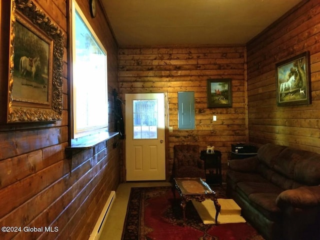 living room featuring plenty of natural light and a baseboard radiator
