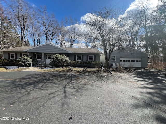 single story home with a garage