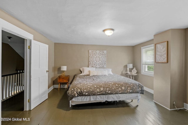 bedroom featuring hardwood / wood-style floors