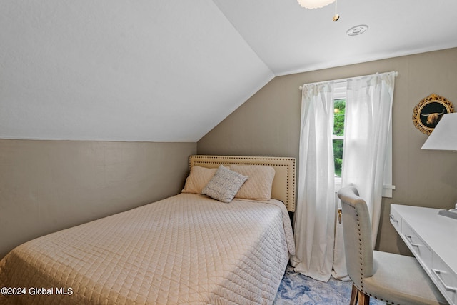 bedroom with vaulted ceiling