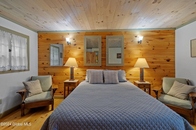 bedroom with wood-type flooring, wood ceiling, and wood walls