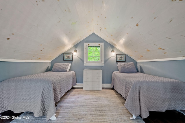 bedroom with vaulted ceiling