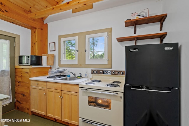 kitchen with light tile flooring, white electric range, black fridge, beamed ceiling, and sink