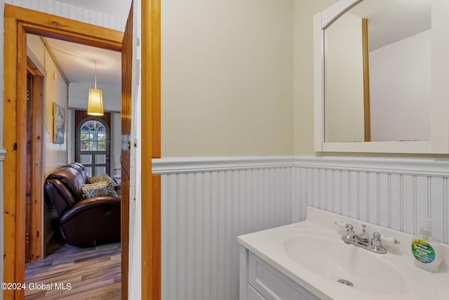 bathroom featuring hardwood / wood-style floors and vanity