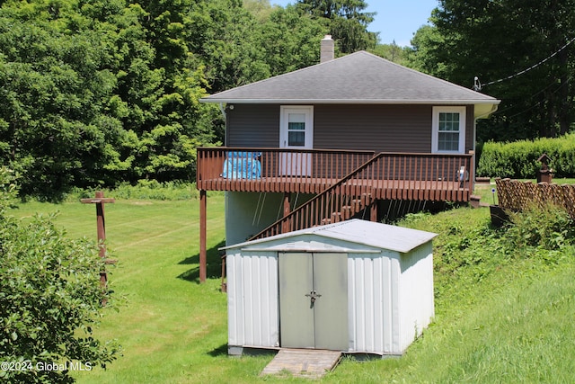 view of outbuilding with a lawn