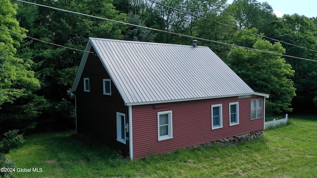 302 Edwards Hill Rd, Johnsburg, NY 12811 - view of side of home featuring a yard