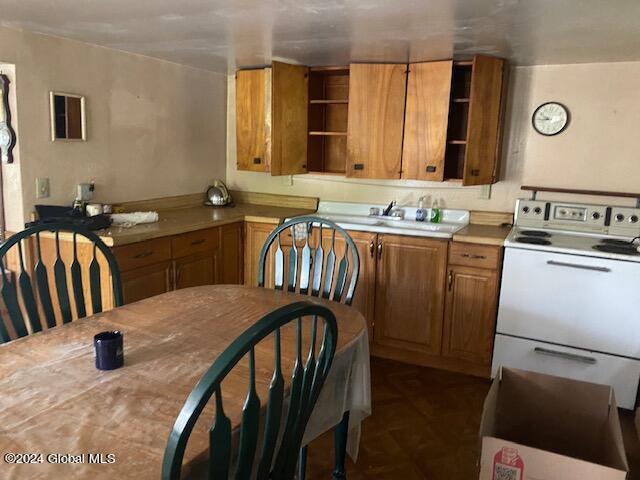 302 Edwards Hill Rd, Johnsburg, NY 12811 - kitchen featuring washer / dryer and sink