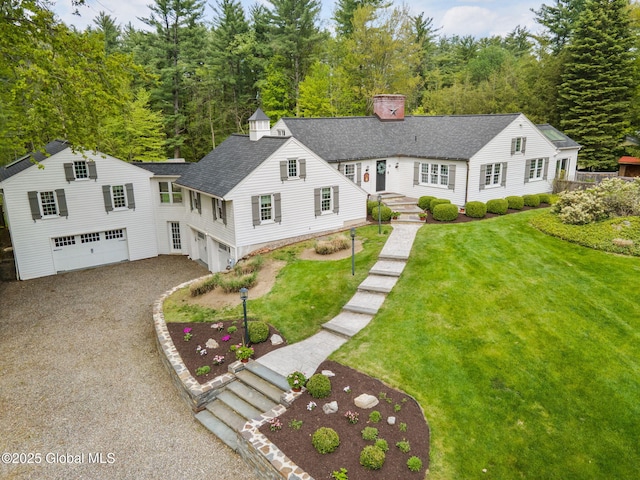 93 Font Grove Rd, Bethlehem, NY 12159 - view of front of property featuring a garage, a chimney, a shingled roof, a front lawn, and gravel driveway