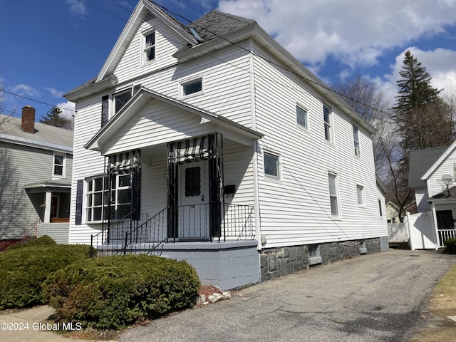 view of property with covered porch