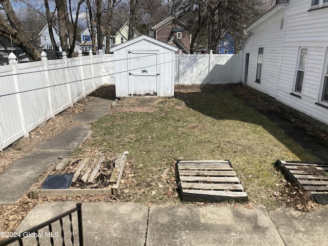22 Lexington Ave, Gloversville, NY 12078 - view of yard featuring a storage shed, an outdoor structure, and a fenced backyard