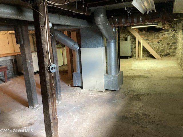 basement featuring heating unit