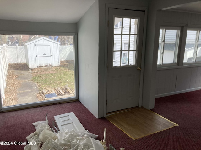 interior space featuring carpet