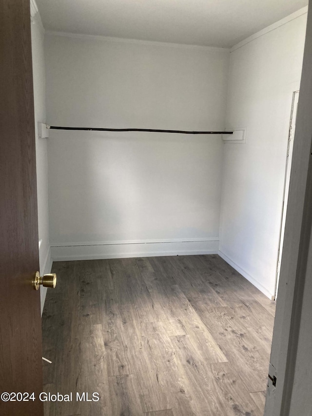 22 Lexington Ave, Gloversville, NY 12078 - empty room featuring baseboards, ornamental molding, and wood finished floors