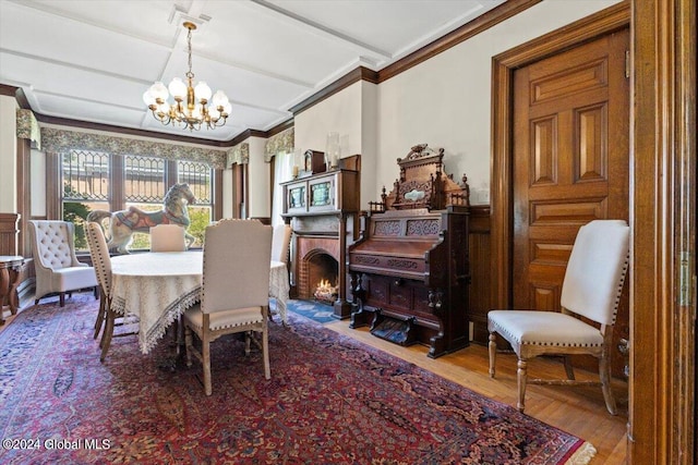 dining room featuring a chandelier and hardwood / wood-style floors