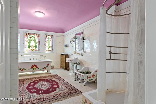 bathroom with tile walls