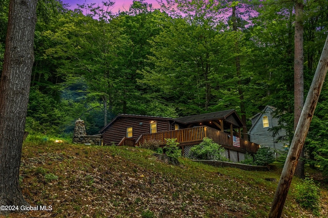 view of front of home with a deck