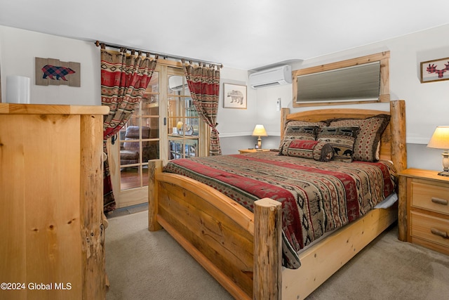 bedroom featuring light carpet and a wall unit AC