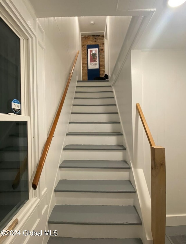 staircase with beverage cooler