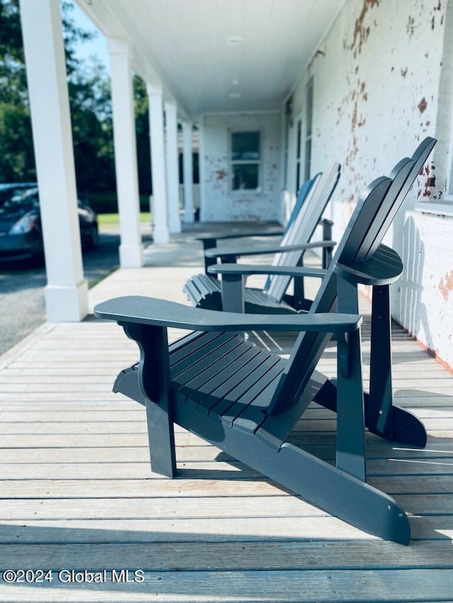 wooden deck featuring a porch