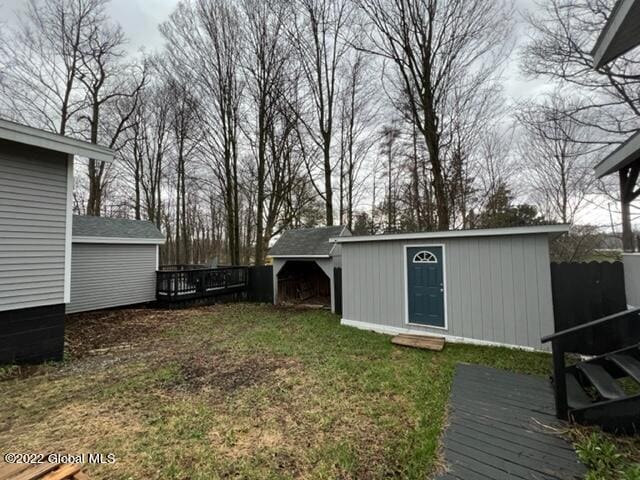 view of outdoor structure featuring a yard