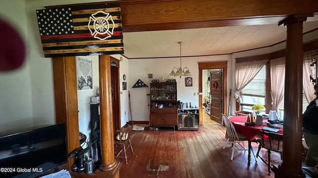 interior space with beamed ceiling, dark wood-type flooring, and ornate columns