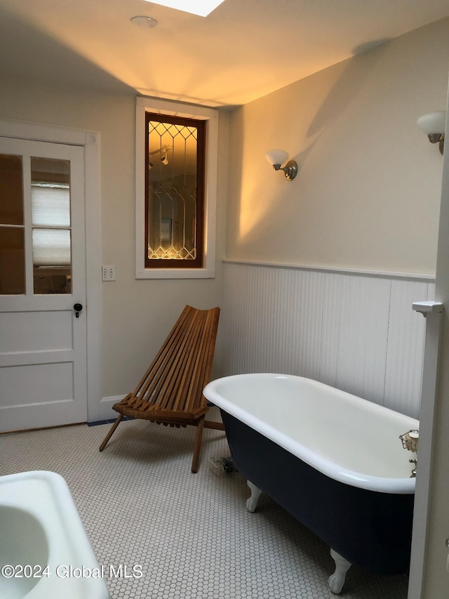 bathroom featuring a tub to relax in