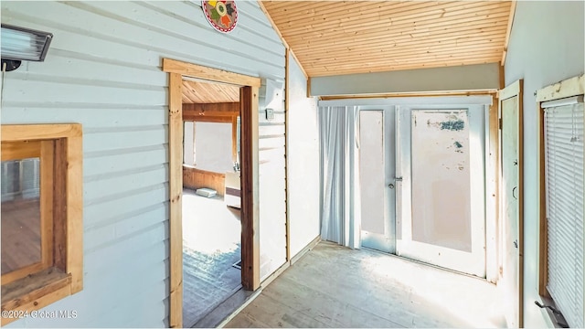 interior space with vaulted ceiling and wood ceiling