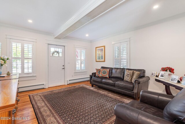 living room featuring beamed ceiling, a baseboard radiator, ornamental molding, and hardwood / wood-style floors