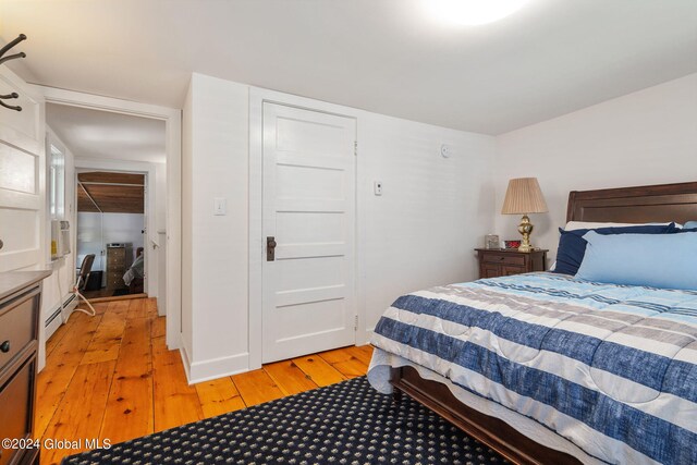 bedroom featuring light hardwood / wood-style flooring