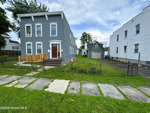 view of front facade featuring a front lawn and a garage