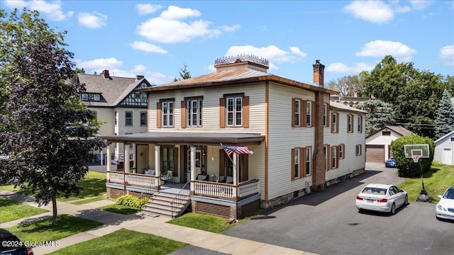 107-109 Lake Ave, Saratoga Springs, Inside, NY 12866 - view of front of home with an outbuilding, covered porch, and a garage