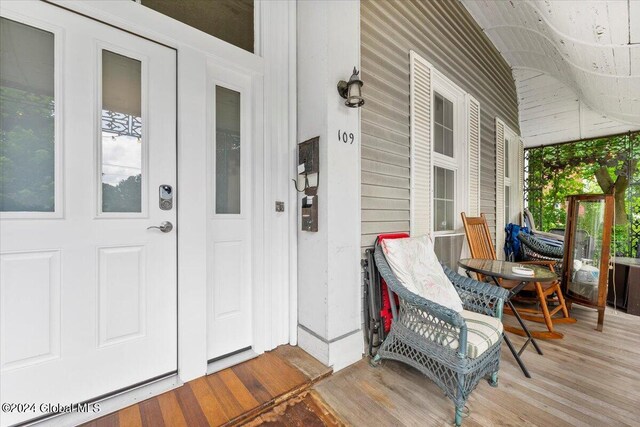 107-109 Lake Ave, Saratoga Springs, Inside, NY 12866 - view of exterior entry featuring a porch