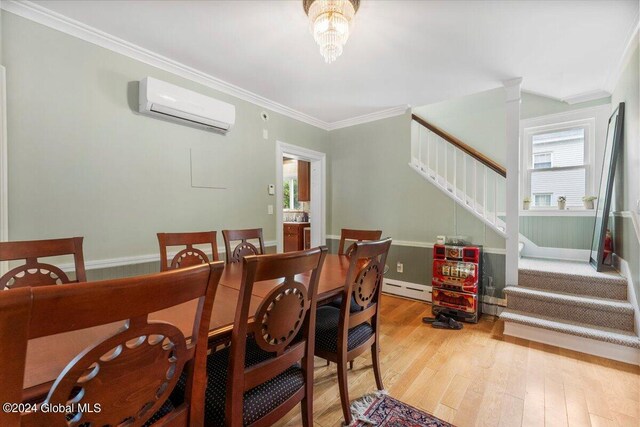 107-109 Lake Ave, Saratoga Springs, Inside, NY 12866 - dining area with ornamental molding, a baseboard radiator, a wall mounted AC, wood finished floors, and stairs