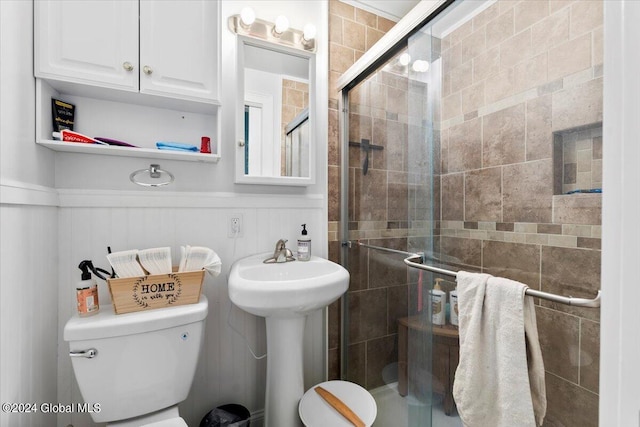 107-109 Lake Ave, Saratoga Springs, Inside, NY 12866 - full bath featuring a shower stall, toilet, a sink, and a wainscoted wall