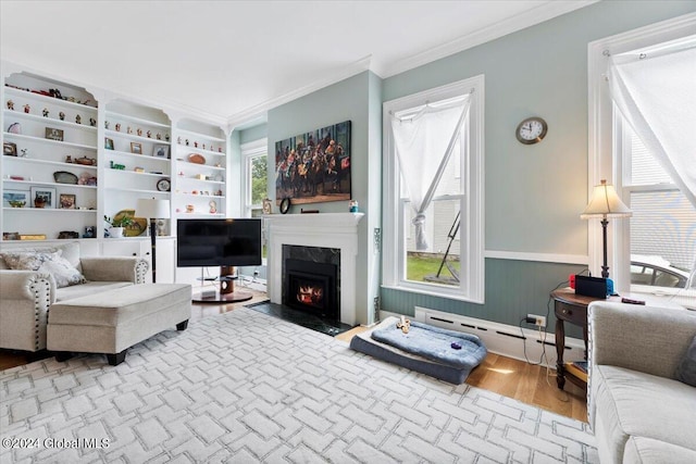 living room with a baseboard radiator, a fireplace, crown molding, and wood-type flooring