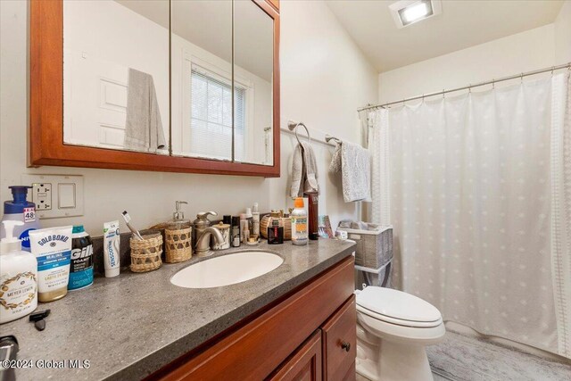 107-109 Lake Ave, Saratoga Springs, Inside, NY 12866 - full bathroom with toilet, curtained shower, and vanity