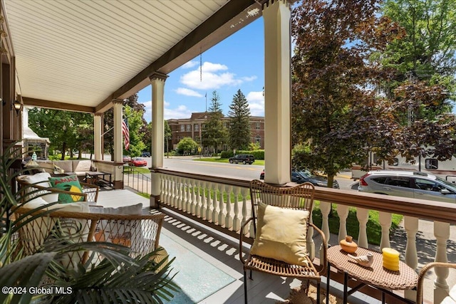 balcony featuring a porch