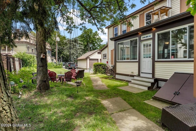 view of yard featuring a garage