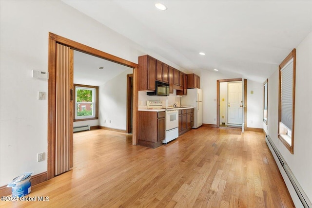 107-109 Lake Ave, Saratoga Springs, Inside, NY 12866 - kitchen with light wood-type flooring, white appliances, light countertops, lofted ceiling, and a baseboard radiator