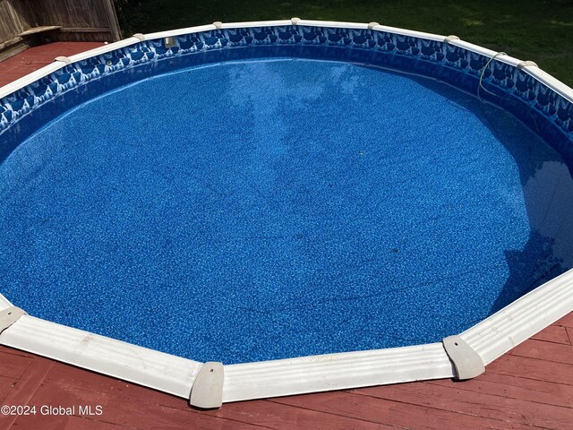 view of pool featuring a deck