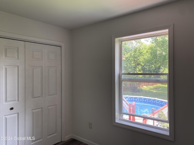 unfurnished bedroom featuring a closet