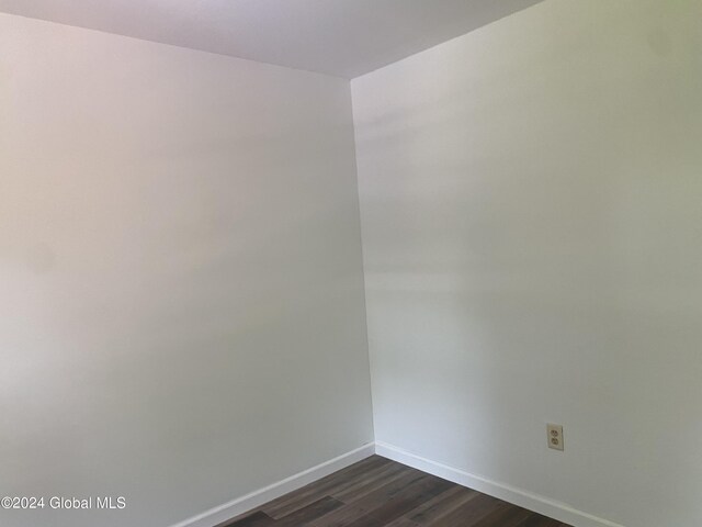 unfurnished room featuring hardwood / wood-style floors