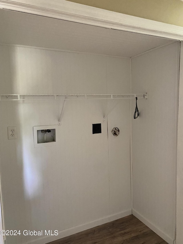 laundry area with laundry area, baseboards, washer hookup, and dark wood finished floors