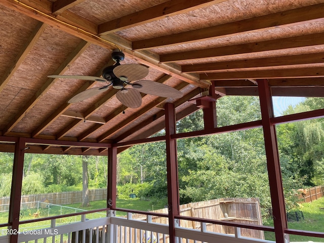 exterior space with ceiling fan and a fenced backyard