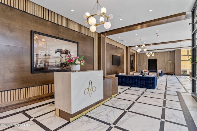 reception area with an inviting chandelier