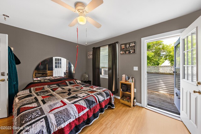 bedroom with ceiling fan and light hardwood / wood-style floors