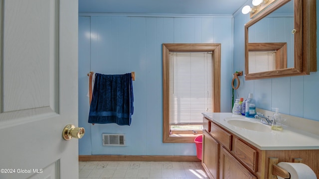 bathroom with vanity and tile patterned floors