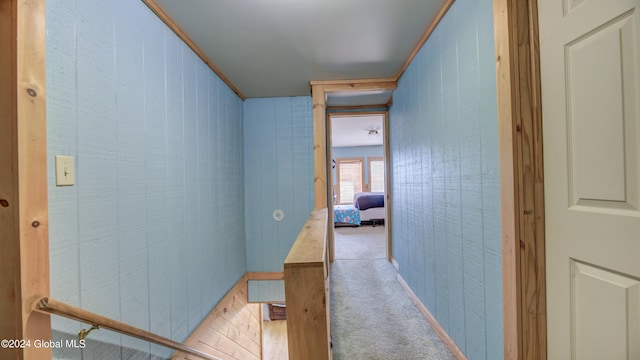 hallway featuring light carpet