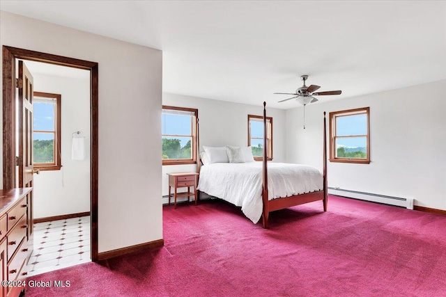 unfurnished bedroom featuring ceiling fan, a baseboard heating unit, and tile patterned flooring