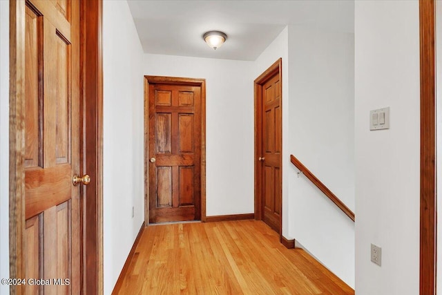 hallway featuring light hardwood / wood-style flooring